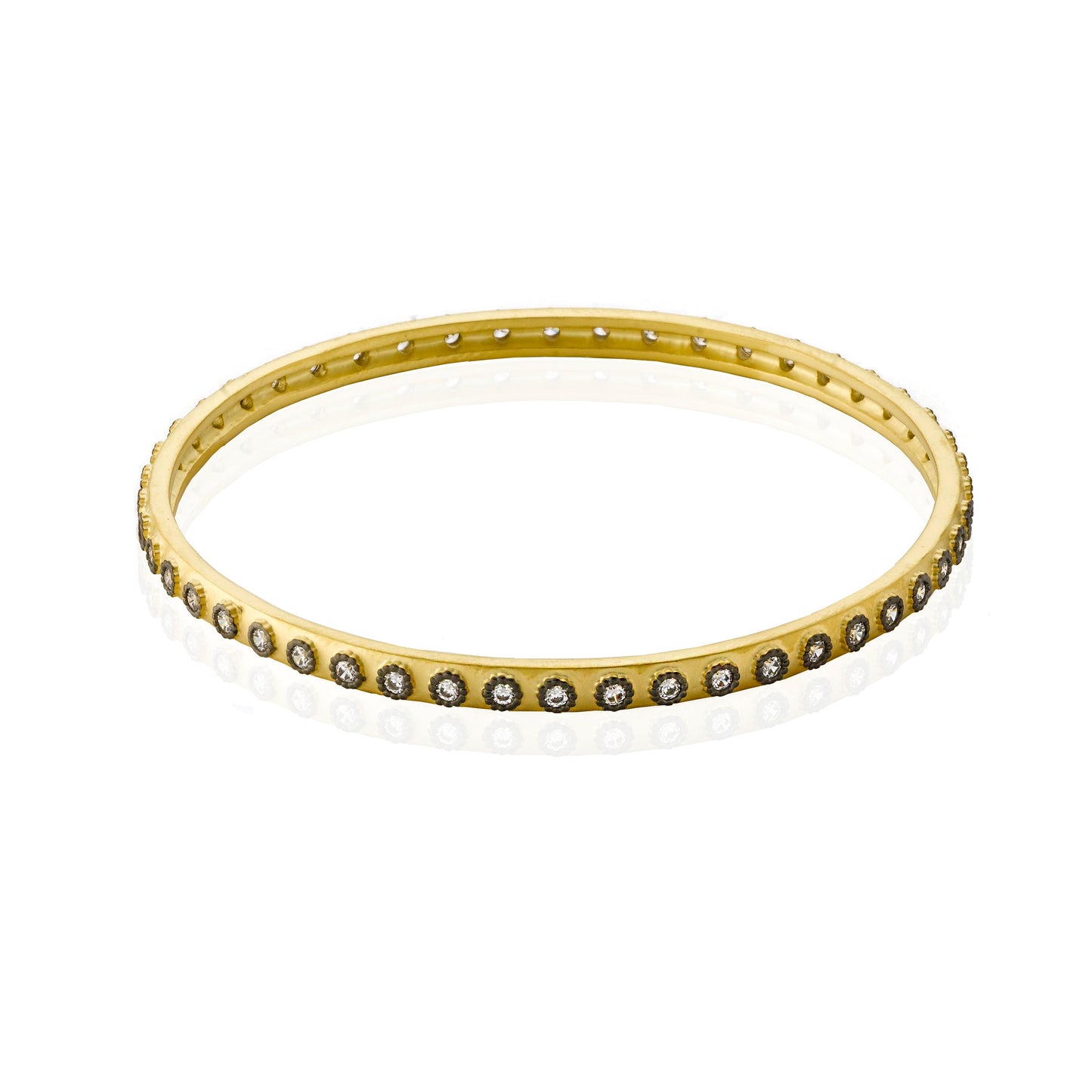 Cosmopolitan Satin 14K Gold Plated Bangle With CZ In Black Rhodium Bezels Wholesale