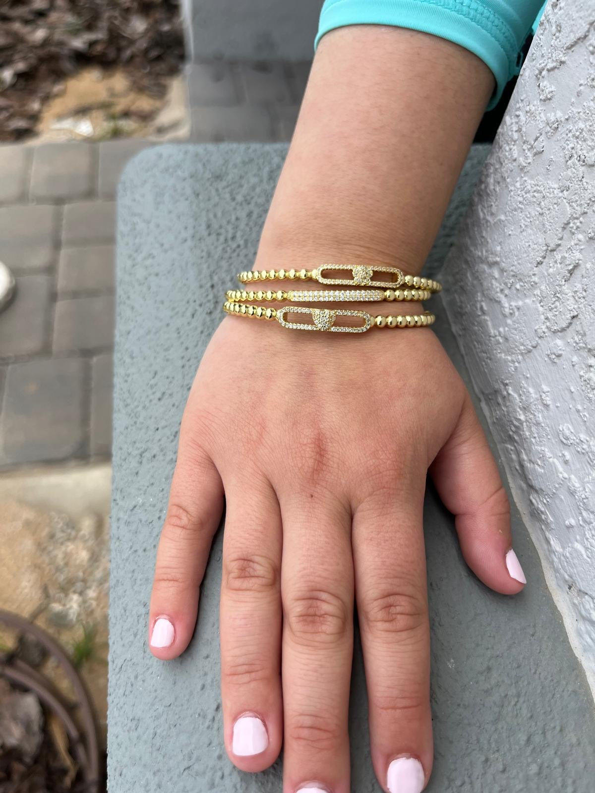 14K Gold Plated Oval Bead Clasped Bangle Accented With Cz Bar Center Wholesale