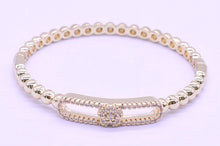 14K Gold Plated Oval Bead Clasped Bangle Accented With Cz Flower Bar Center Wholesale