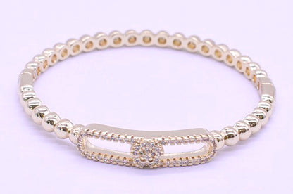 14K Gold Plated Oval Bead Clasped Bangle Accented With Cz Flower Bar Center