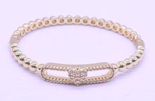 14K Gold Plated Oval Bead Clasped Bangle Accented With Cz Heart Bar Center Wholesale
