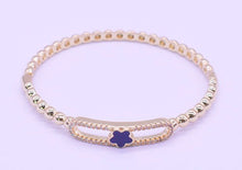 14K Gold Plated Oval Bead Clasped Bangle Accented With Cz & Mother Of Pearl Flower Bar Center