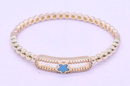 14K Gold Plated Oval Bead Clasped Bangle Accented With Cz & Mother Of Pearl Flower Bar Center Wholesale