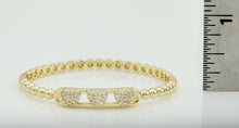 14K Gold Plated Oval Bead Clasped Bangle Accented With 3 Cz Hearts Bar Center