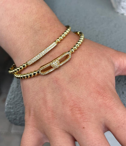 14K Gold Plated Oval Bead Clasped Bangle Accented With Cz Bar Center Wholesale
