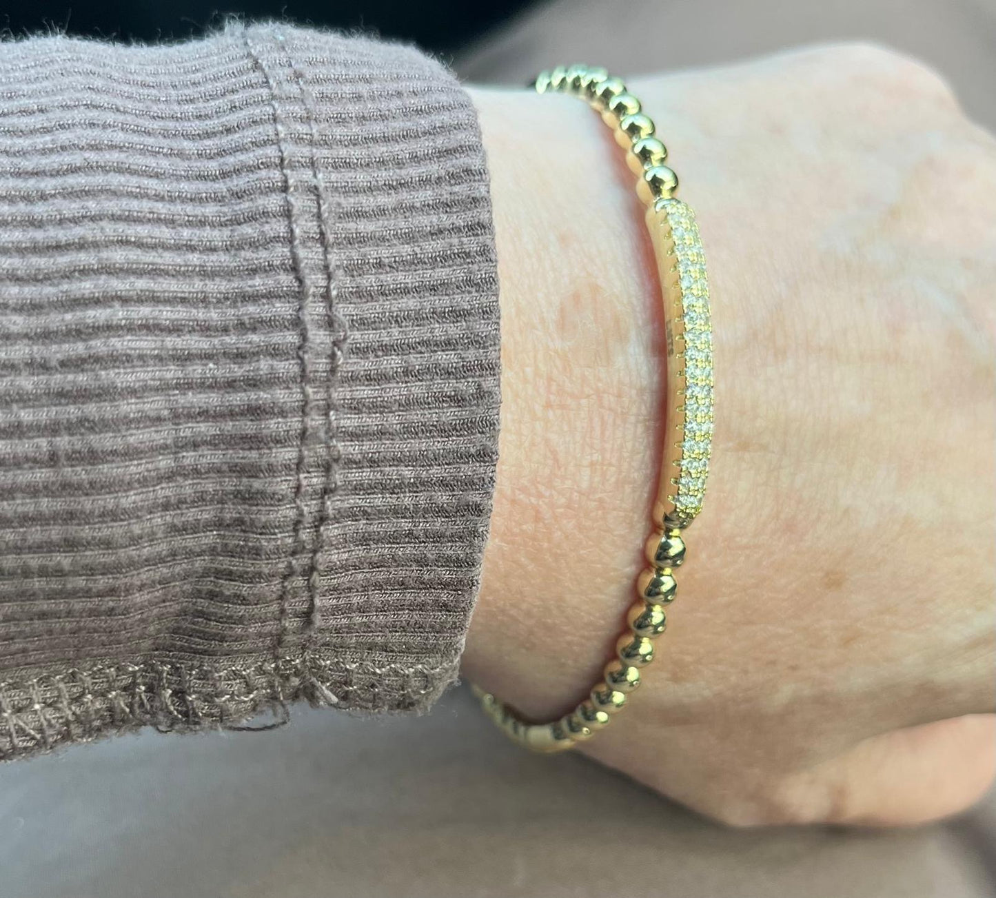 14K Gold Plated Oval Bead Clasped Bangle Accented With Cz Bar Center Wholesale
