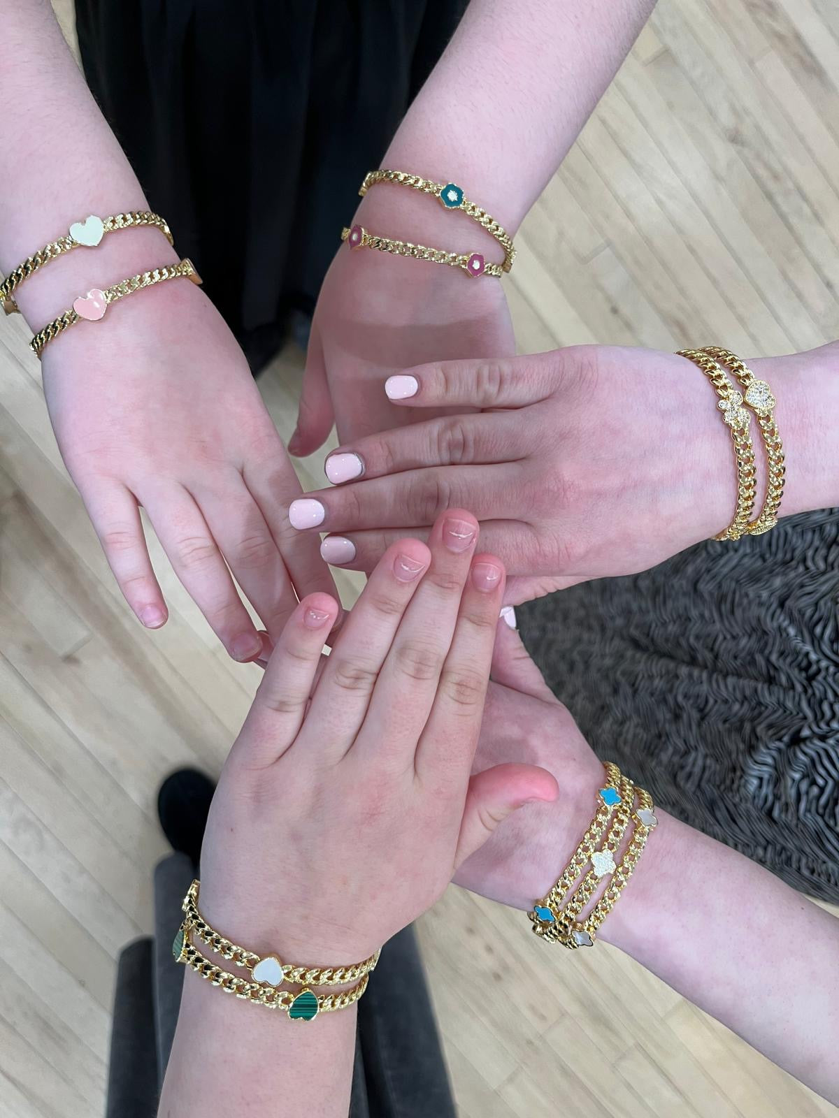 Link Bangle Accented With Mother Of Pearl Clovers Wholesale